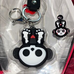 Marcy Skelanimals monkey keychain and pin set